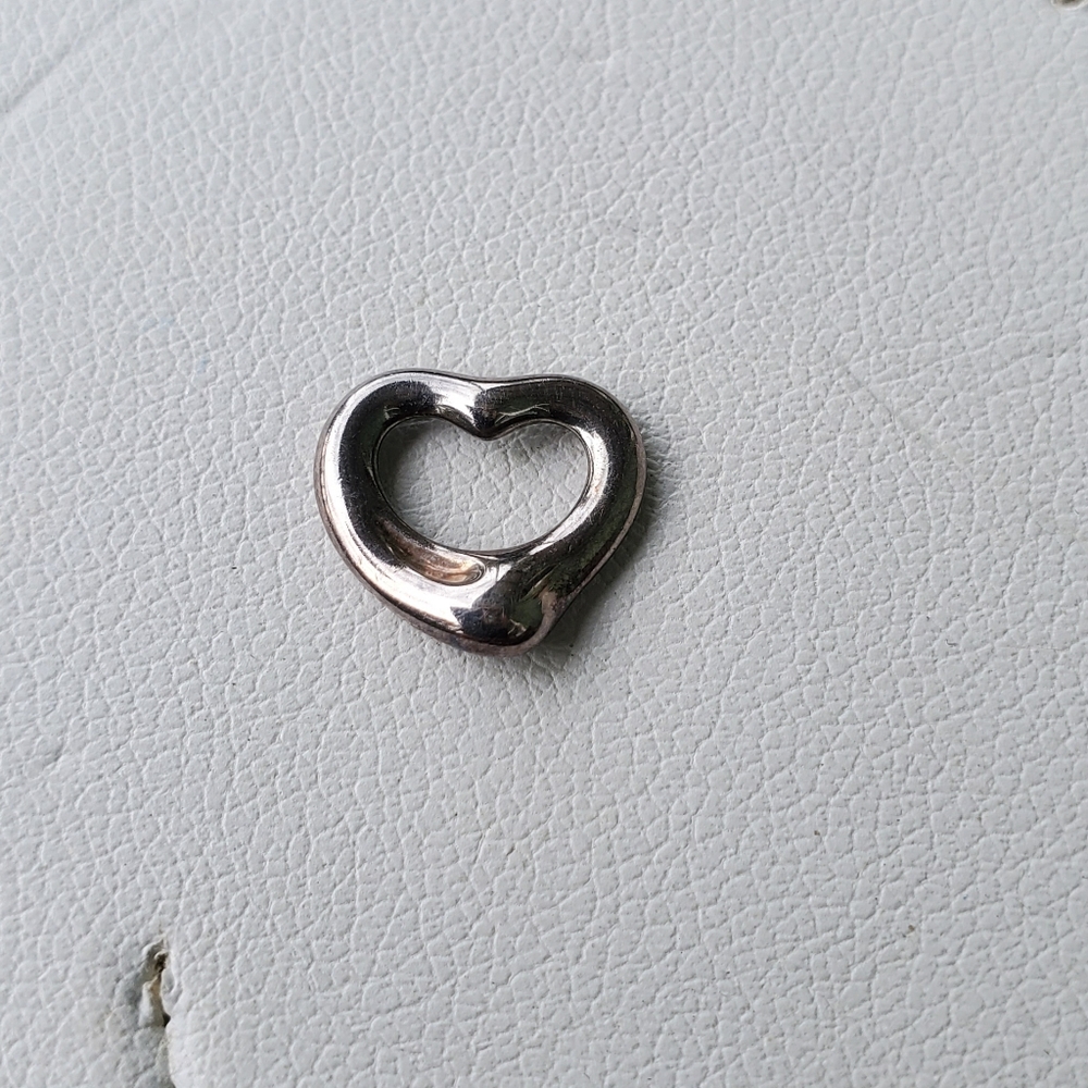Tiny Tiffany & CO heart pendant